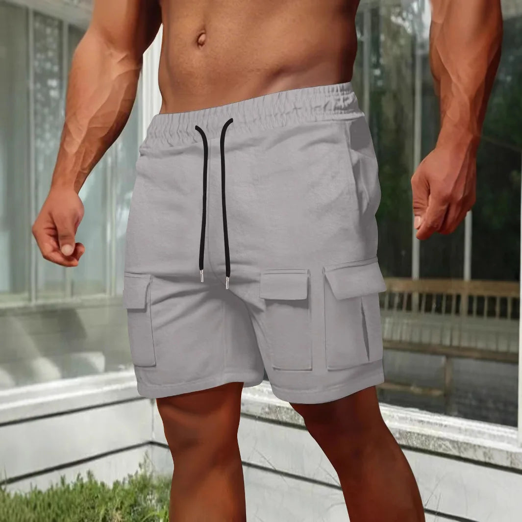 Men's short casual workwear multi-pocket shorts, summer solid-color sports parkour elastic drawstring convenient shorts