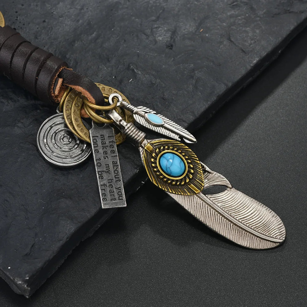 European and American new popular creative keychains men's and women's gifts alloy bronze horns retro woven cowhide pendant