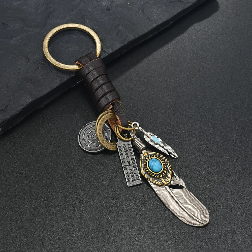 European and American new popular creative keychains men's and women's gifts alloy bronze horns retro woven cowhide pendant