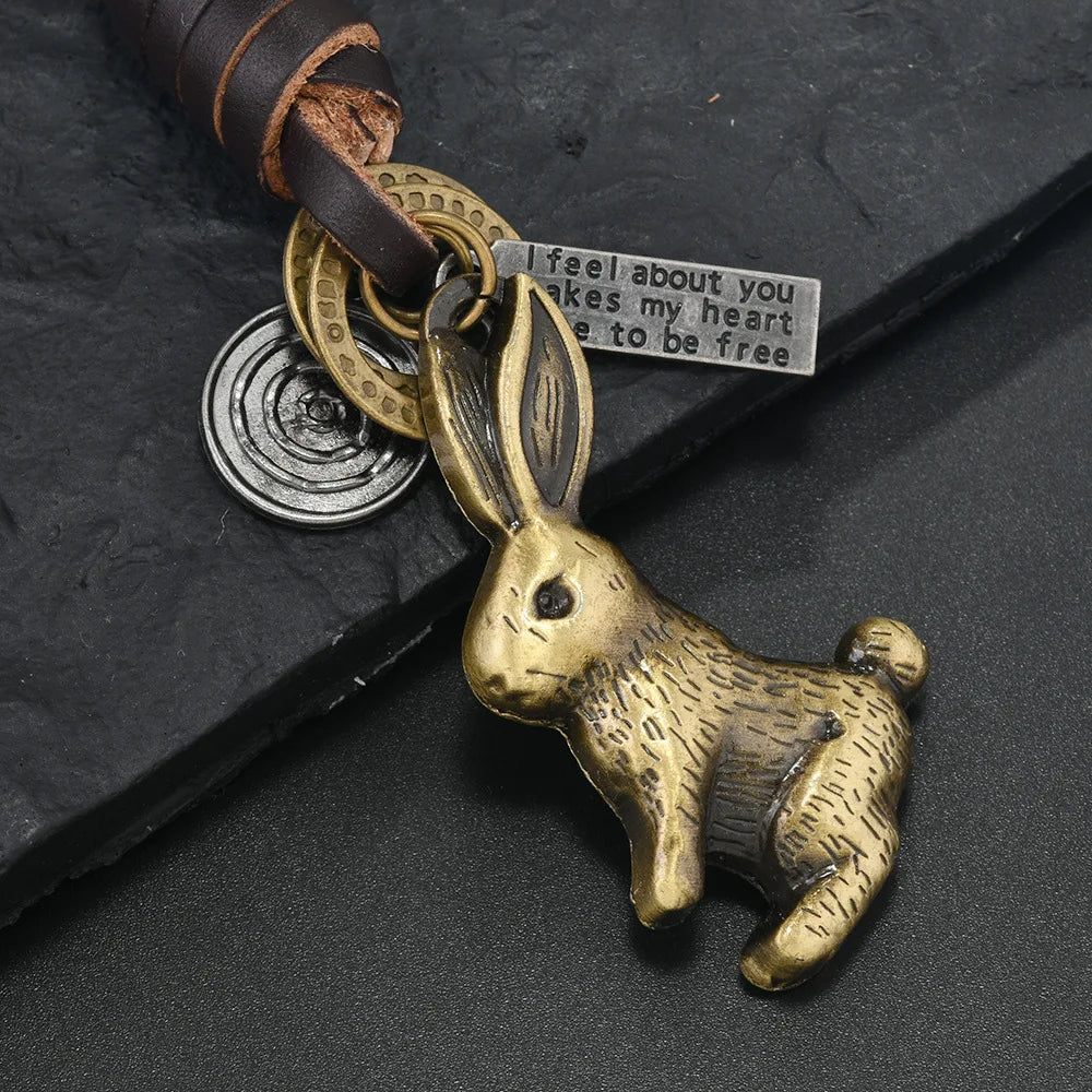 European and American new popular creative keychains men's and women's gifts alloy bronze horns retro woven cowhide pendant