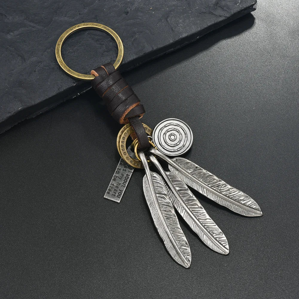 European and American new popular creative keychains men's and women's gifts alloy bronze horns retro woven cowhide pendant